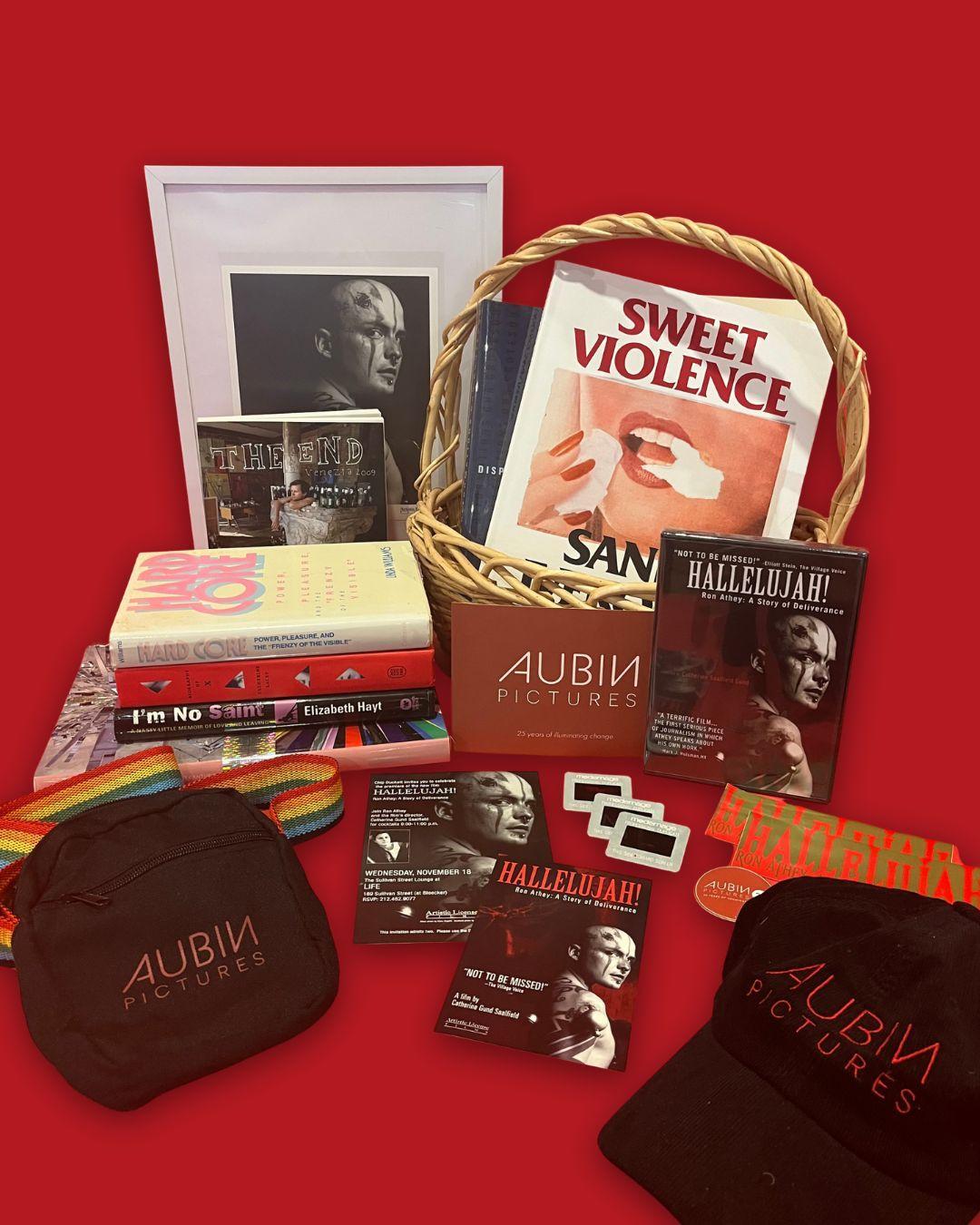 auction basket with books, film ephemera, and merch